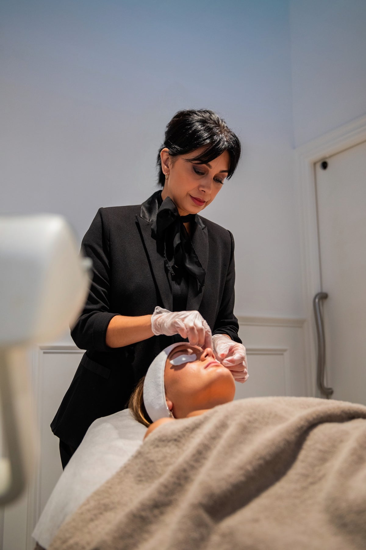 DermaMatrix Renewal treatment preparation in an About Skin treatment room
